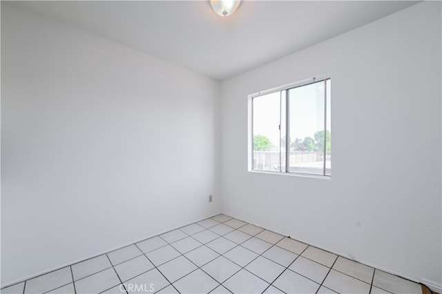 view of tiled spare room