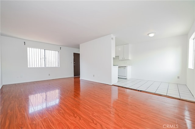 unfurnished living room with light hardwood / wood-style floors