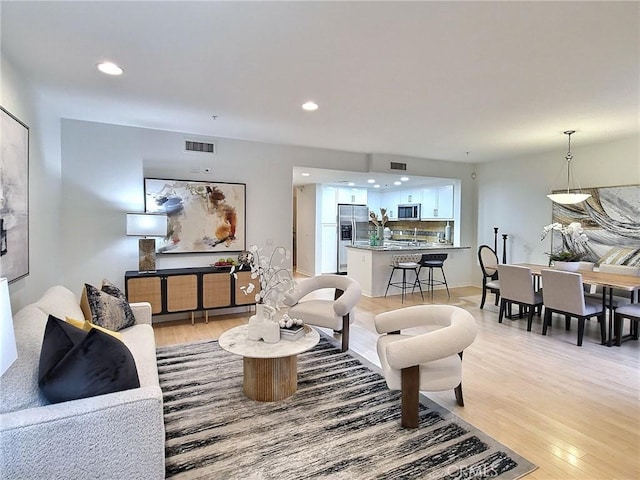 living room with light wood-type flooring