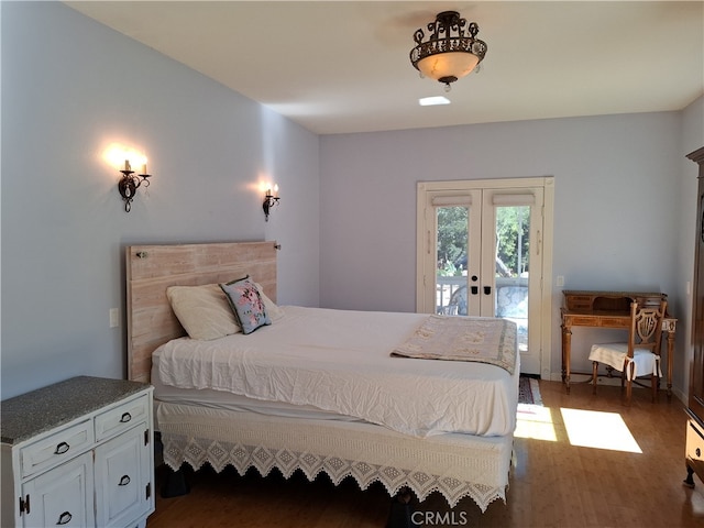 bedroom featuring french doors, access to outside, and dark hardwood / wood-style flooring