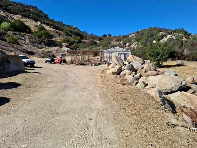 exterior space featuring a mountain view