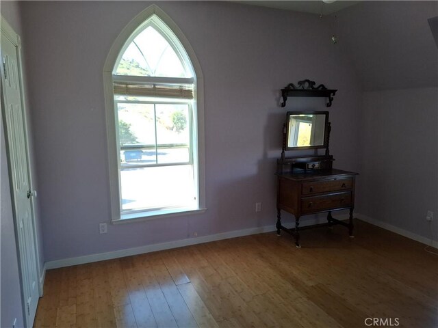 interior space with ceiling fan and light hardwood / wood-style flooring