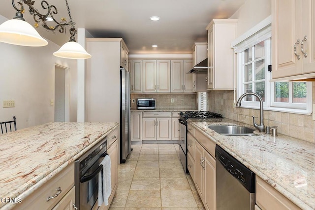 kitchen featuring sink, stainless steel appliances, wall chimney range hood, backsplash, and pendant lighting