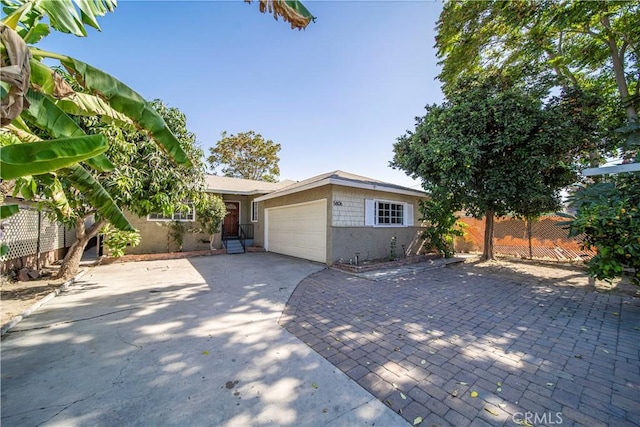 view of front of property with a garage