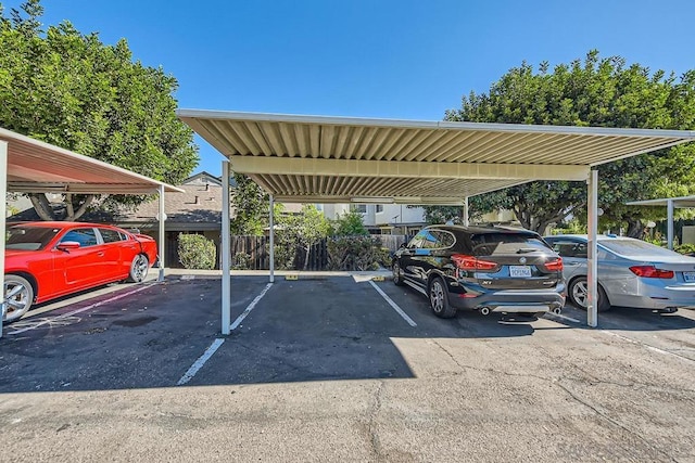 view of vehicle parking featuring a carport