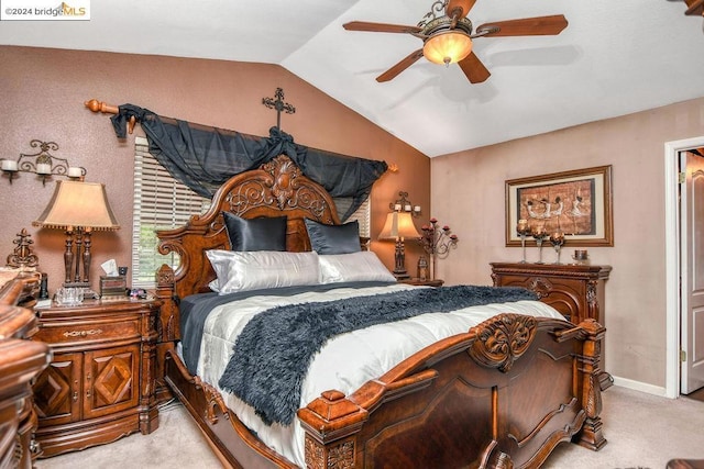 bedroom featuring lofted ceiling, light colored carpet, and ceiling fan