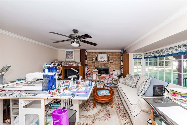 living room featuring ornamental molding, a brick fireplace, and ceiling fan