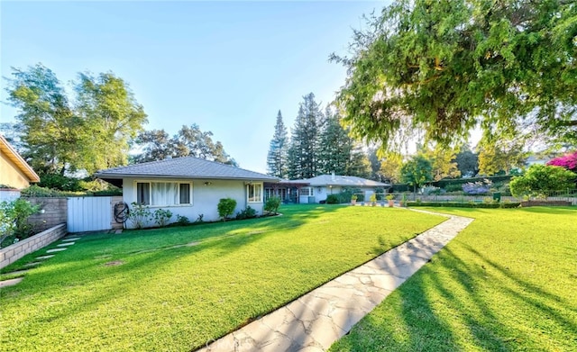 exterior space featuring a front lawn