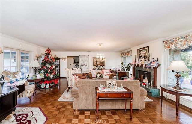 living room with parquet flooring, crown molding, and a healthy amount of sunlight