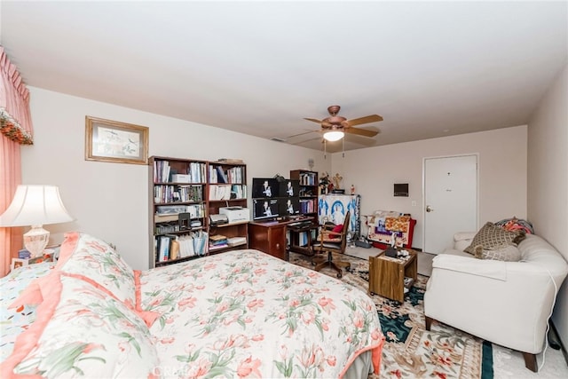 carpeted bedroom featuring ceiling fan