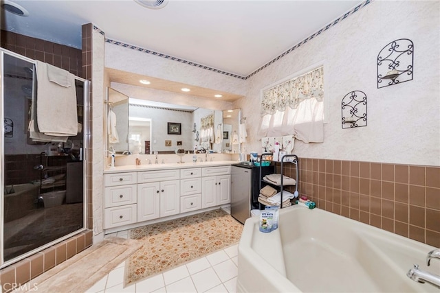 645 W Foothill Blvd, Arcadia, CA 91006 - full bathroom with a bath, double vanity, tile patterned flooring, a stall shower, and wallpapered walls