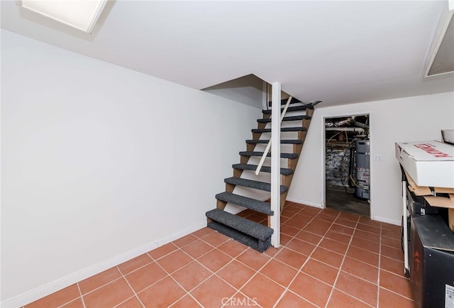 645 W Foothill Blvd, Arcadia, CA 91006 - finished below grade area with water heater, stairway, and tile patterned flooring