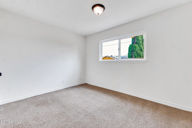 empty room with carpet flooring