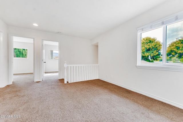 spare room with carpet floors