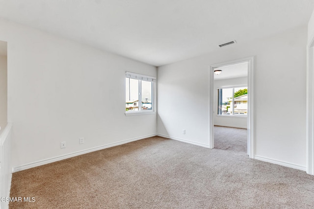 view of carpeted spare room