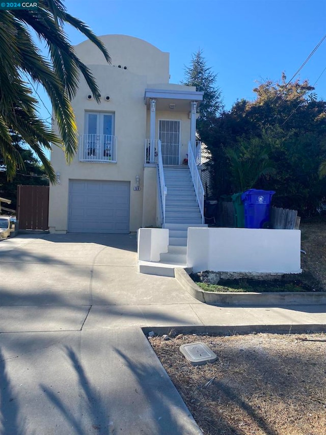 view of front of property with a garage