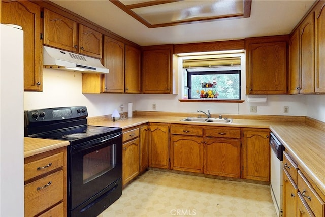 kitchen featuring sink and white appliances