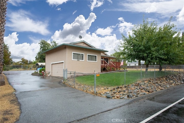 view of property exterior featuring a garage