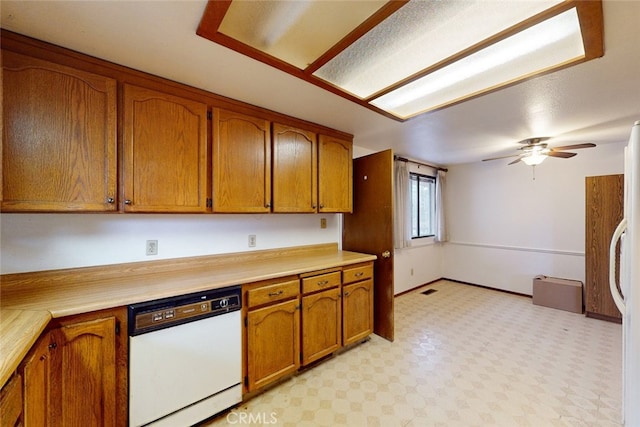 kitchen with white dishwasher and ceiling fan