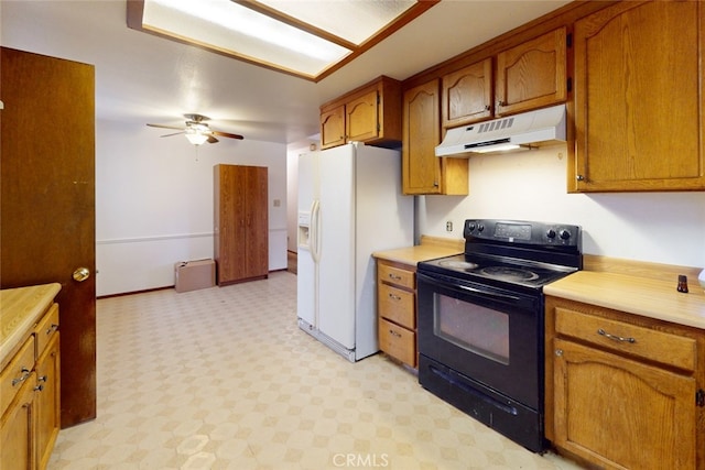 kitchen with black range with electric stovetop, white refrigerator with ice dispenser, and ceiling fan