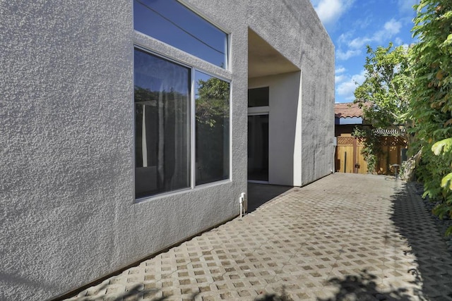 view of home's exterior with a patio