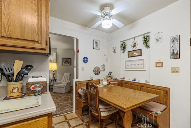 dining room featuring ceiling fan