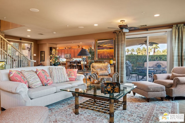 living room featuring ceiling fan