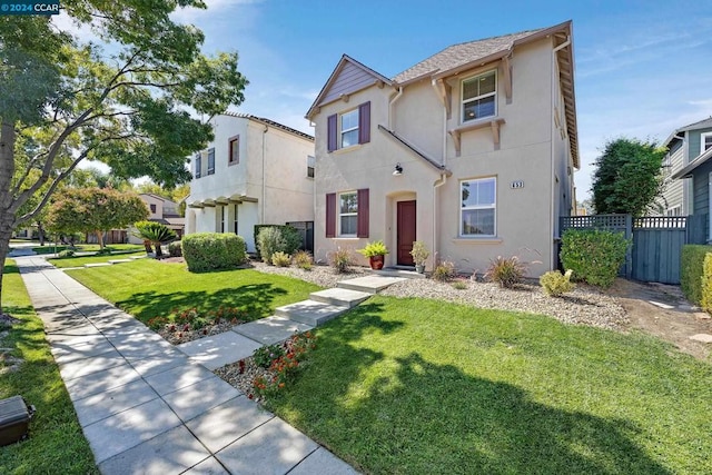 view of front of home with a front lawn