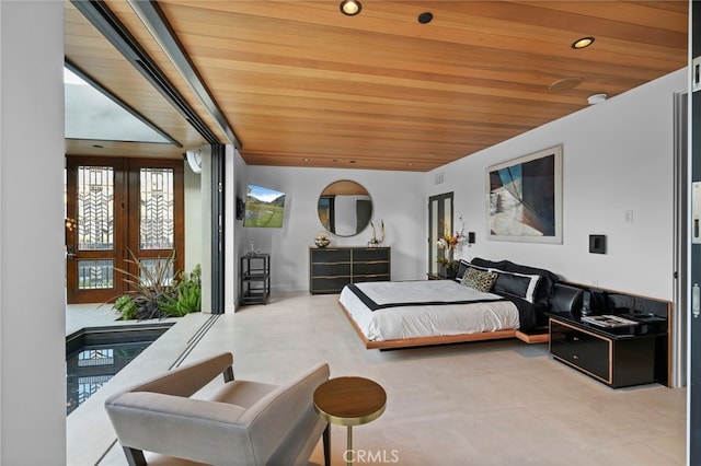 bedroom featuring french doors and wood ceiling