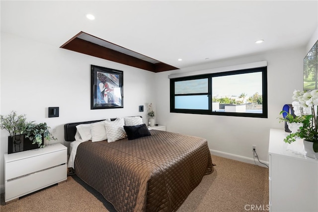 bedroom with light carpet