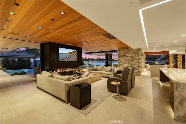 home theater room with wood ceiling