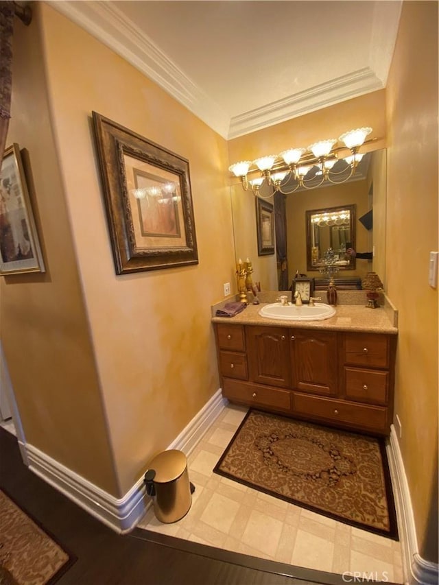 bathroom featuring vanity, tile patterned flooring, and crown molding