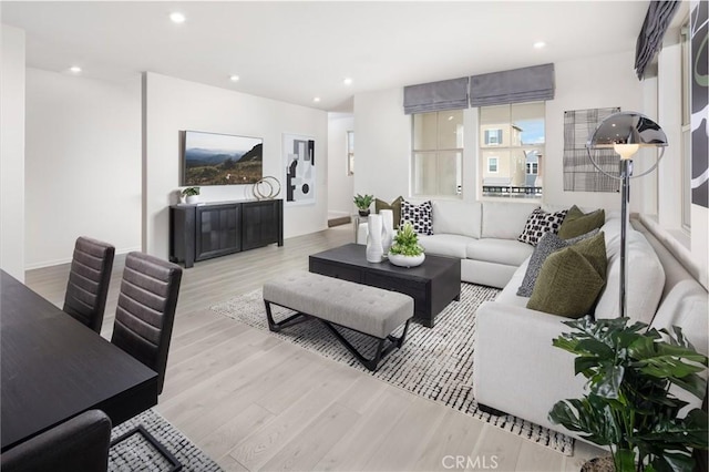 living room with light hardwood / wood-style floors