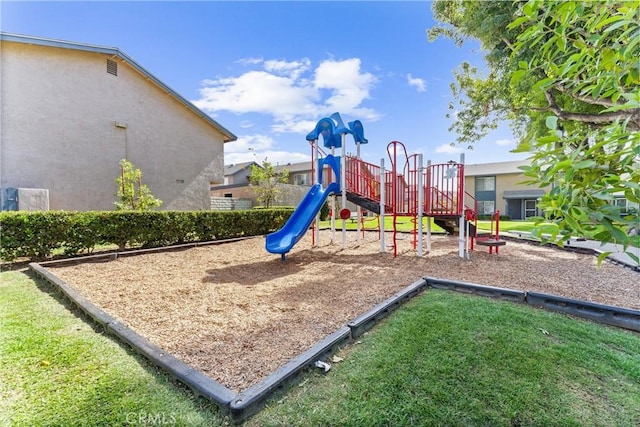 view of playground featuring a lawn