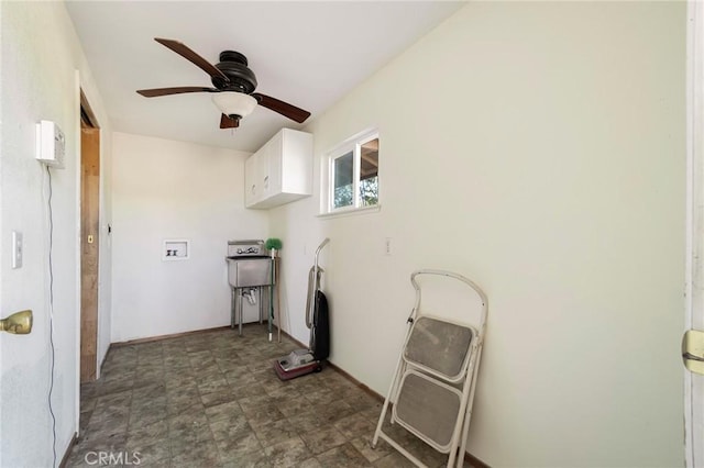 laundry room featuring ceiling fan, cabinets, and hookup for a washing machine