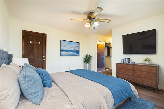 bedroom featuring hardwood / wood-style floors and ceiling fan