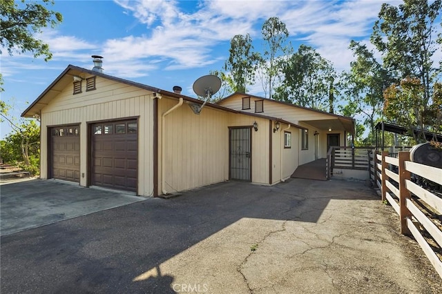 exterior space with a garage