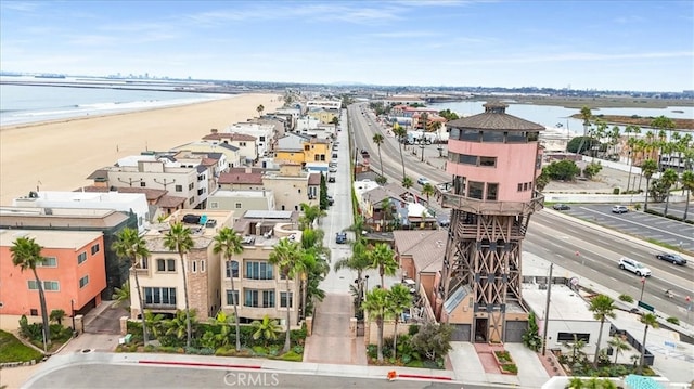 drone / aerial view with a view of the beach and a water view