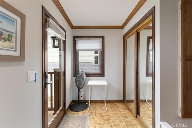 hall with crown molding and light parquet flooring