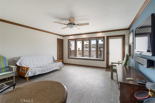 living room featuring ceiling fan and crown molding