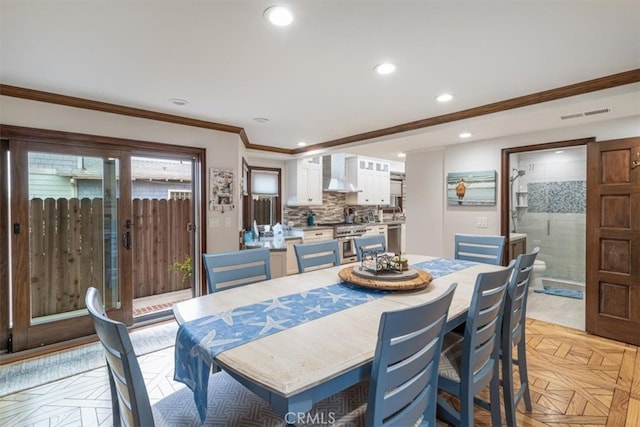 dining room with crown molding