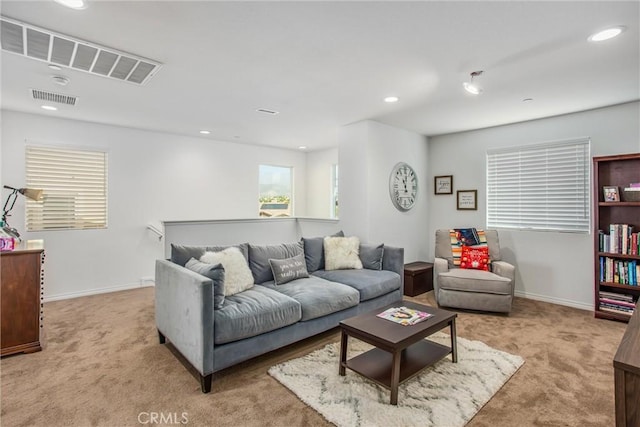 living room with light colored carpet