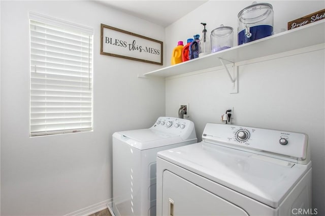 laundry room featuring washing machine and dryer