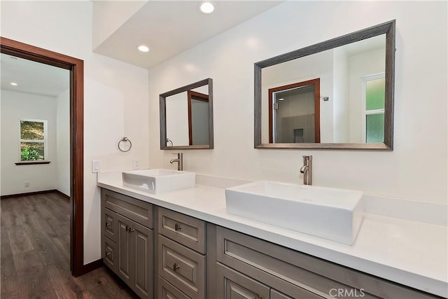 bathroom featuring vanity and hardwood / wood-style flooring