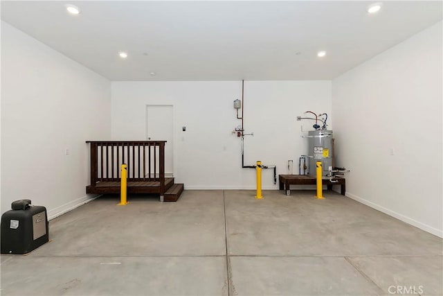 1285 N State Highway 173, Lake Arrowhead, CA 92352 - garage with secured water heater, recessed lighting, and baseboards