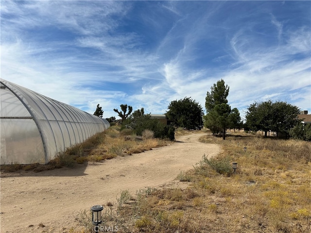 view of yard featuring a rural view