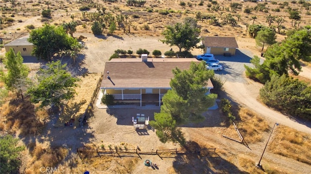 birds eye view of property with a rural view