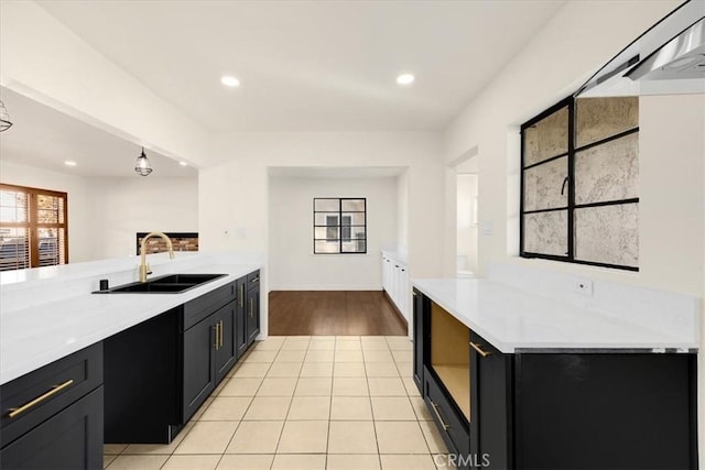 kitchen with sink and light tile patterned floors