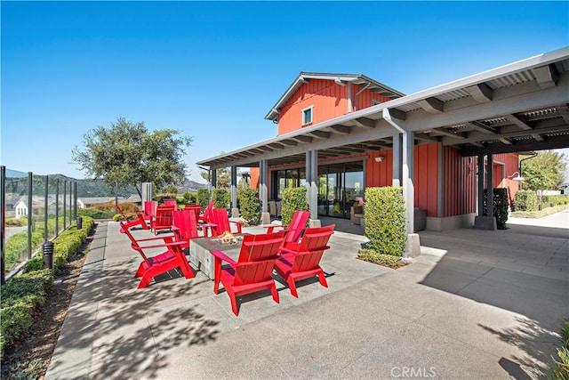 view of patio / terrace with a fire pit