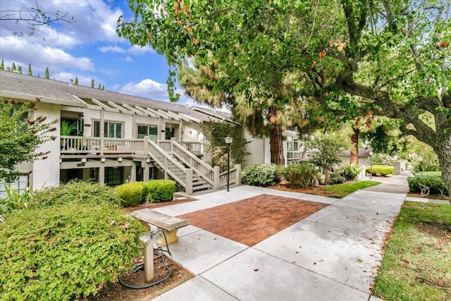 view of home's community with a wooden deck